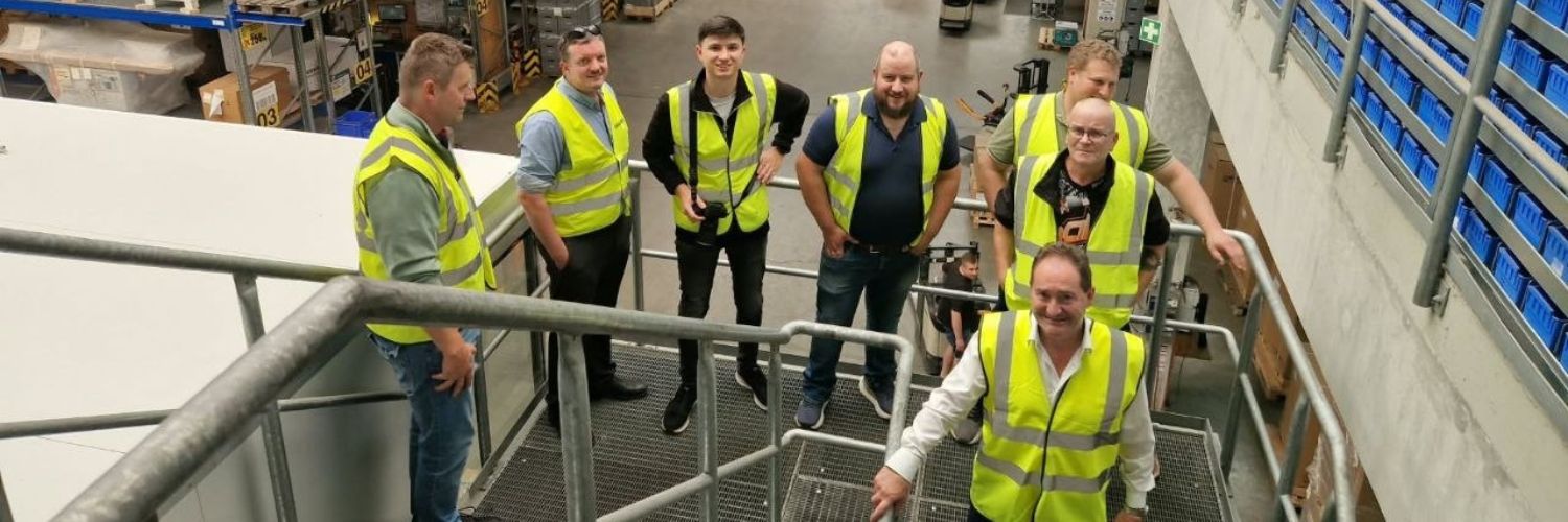 Millennium Machinery team visiting Stürmer in Germany, celebrating Padraig's 20 years of service and their long-standing partnership.
