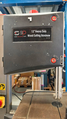 Used 12 inch heavy-duty wood cutting bandsaw in good working condition
