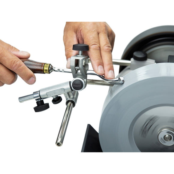 Grinding device for tubes