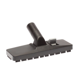 Floor nozzle with folding brush
